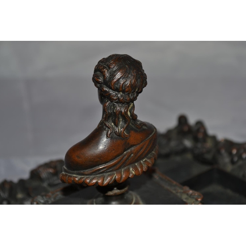 445 - An antique bronze desk stand mounted with classical figures - approx 17