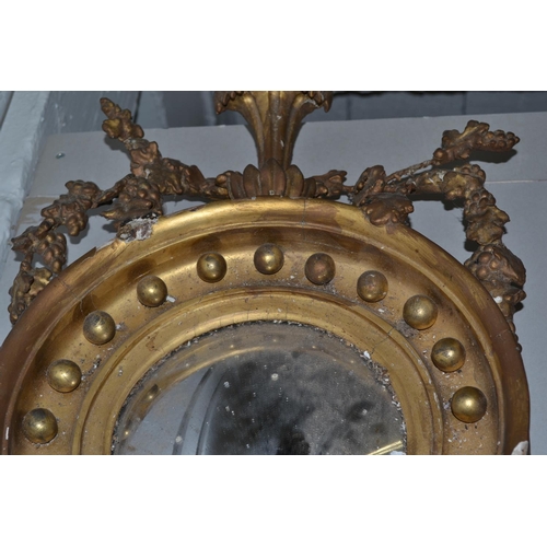 500 - A 19th century round framed mirror with plaster decoration - 25