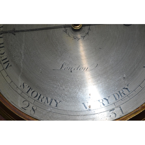 509 - A 19th century mercury wheel barometer by Lione & Co of London