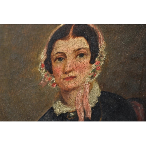 511 - A small Oil on Canvas portrait of a 19th century woman -  unsigned - 15