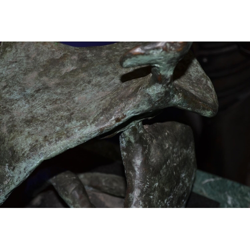 529 - A large abstract bronze sculpture on a marble plinth with green patination - total height including ... 