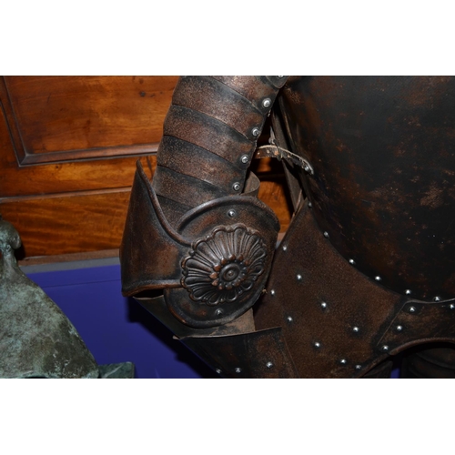 130 - A lifesize decorative 17th century style suit of armour on wooden stand - approx 68