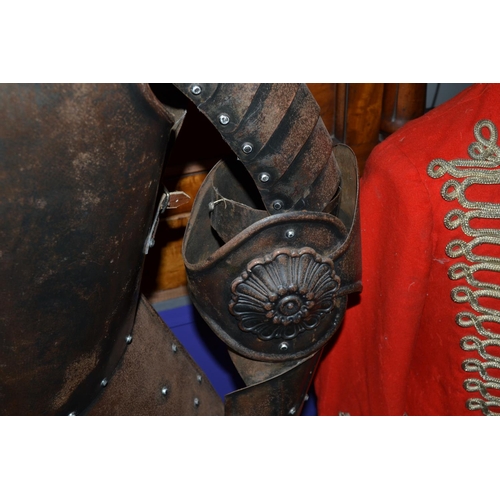 130 - A lifesize decorative 17th century style suit of armour on wooden stand - approx 68