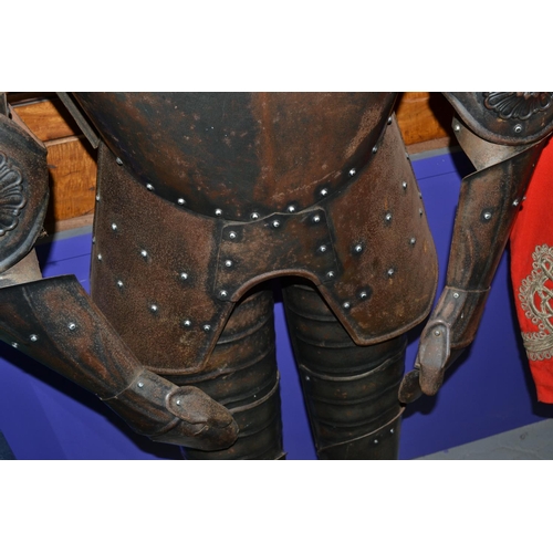 130 - A lifesize decorative 17th century style suit of armour on wooden stand - approx 68