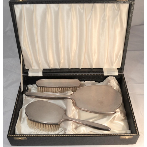 456 - A 3 piece silver dressing table set in box - Birmingham 1958/9