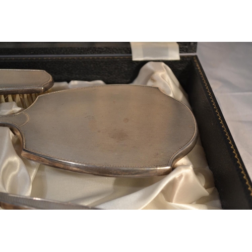 456 - A 3 piece silver dressing table set in box - Birmingham 1958/9