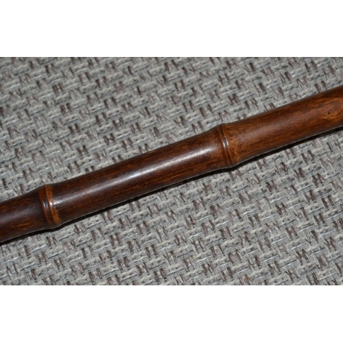 458 - A 19th century bamboo walking stick with Piquetwork decoration.