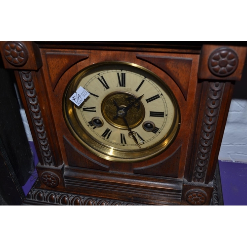 241 - A Mahogany mantel clock by Sidney Silverthorne of Salisbury