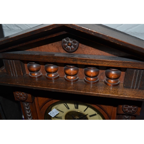 241 - A Mahogany mantel clock by Sidney Silverthorne of Salisbury