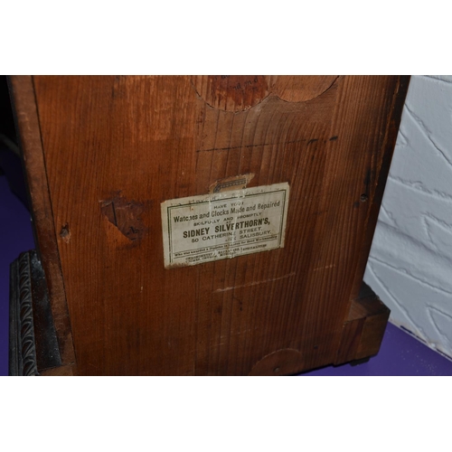 241 - A Mahogany mantel clock by Sidney Silverthorne of Salisbury