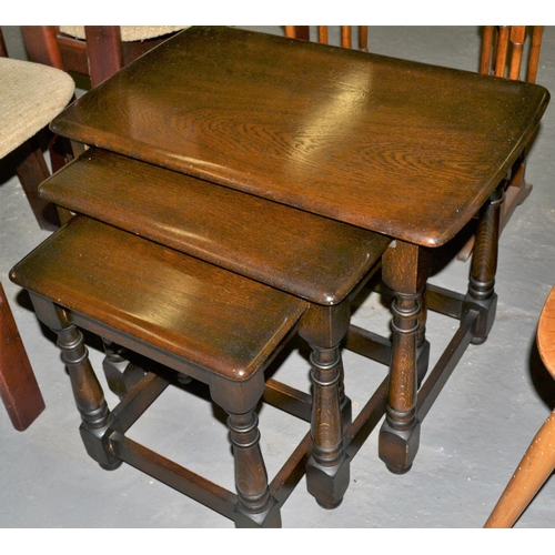 47 - A darkwood nest of 3 tables probably Ercol