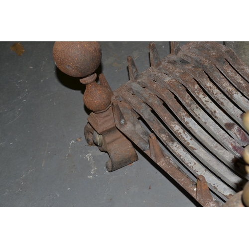 78 - A antique fire grate and and irons
