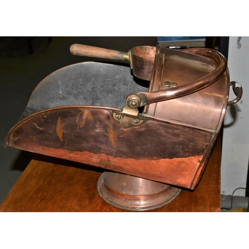 82 - A Victorian copper coal scuttle with shovel