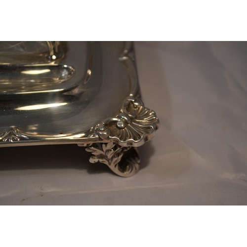 470 - A solid silver desk stand with silver and glass inkwells - the stand London 1901 by W & C Sissons an... 