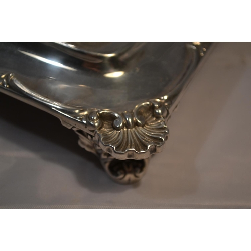 470 - A solid silver desk stand with silver and glass inkwells - the stand London 1901 by W & C Sissons an... 