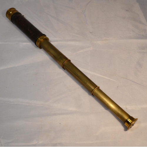 471 - A small antique brass and leather 3 draw telescope