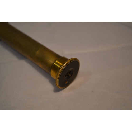 471 - A small antique brass and leather 3 draw telescope