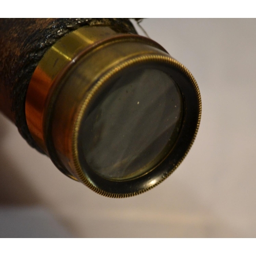 471 - A small antique brass and leather 3 draw telescope