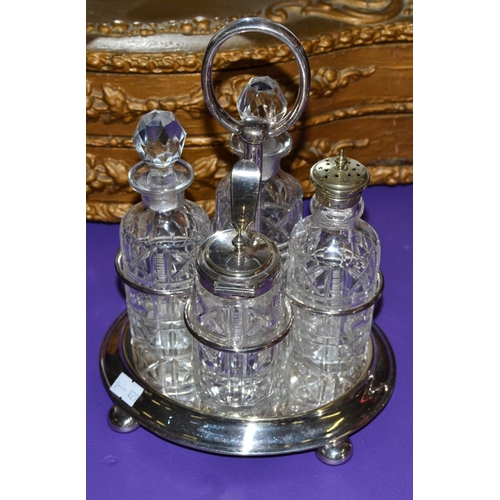 472 - An early 20th century cut glass and silver plate 4 piece cruet set