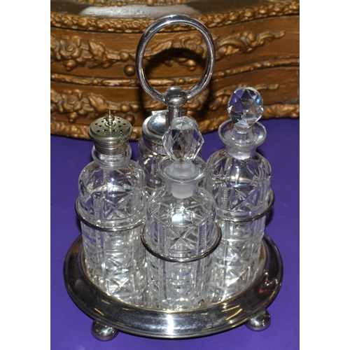 472 - An early 20th century cut glass and silver plate 4 piece cruet set