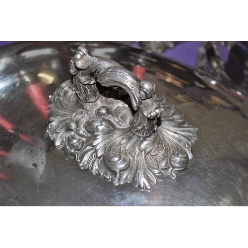 474 - A large pair of Victorian silver plated meat domes