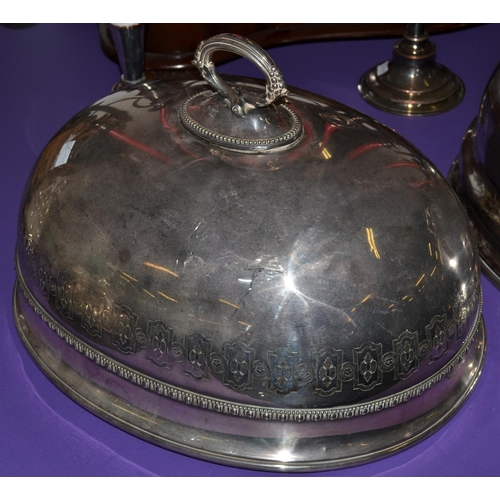 475 - An early 20th century silver plated meat dome with decorative border