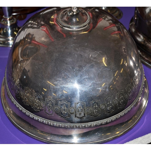 475 - An early 20th century silver plated meat dome with decorative border