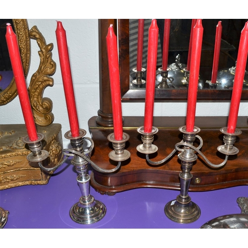 477 - A pair of vintage silver plated 3 branch candelabras and candles