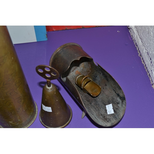 136 - 4 piece of trench art to include a shell case and a pair of military leather pouches