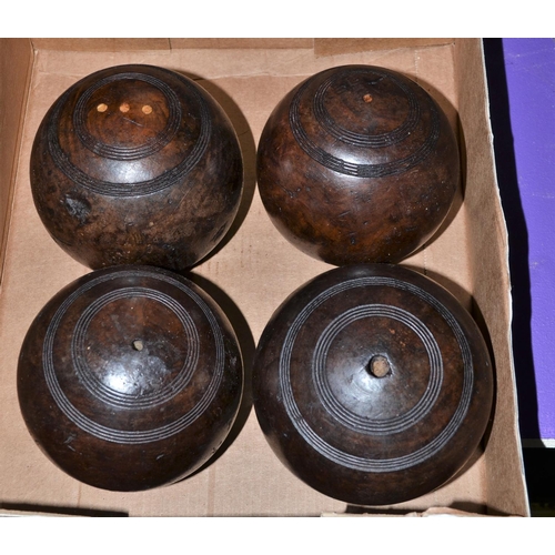 156 - A set of 4 antique wooden bowling balls
