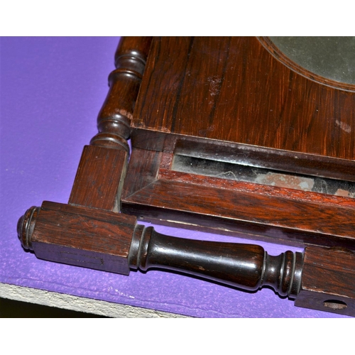 179 - A Victorian Rosewood folding mirror with magnifying glass