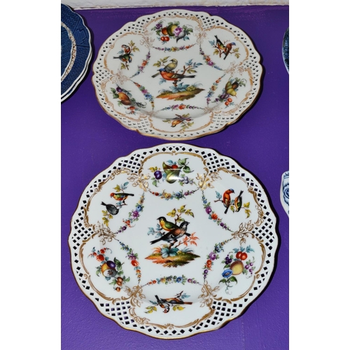 196 - A pair of German (probably Berlin) hand painted cabinet plates painted with birds c.1900