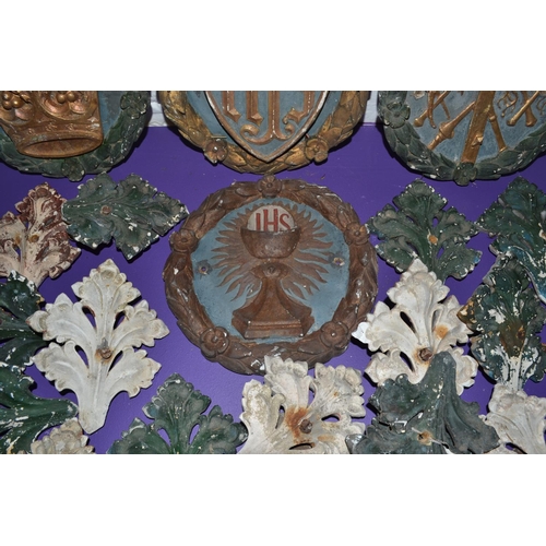 199 - A collection of 19th century or earlier religious plaster plaques and foliage