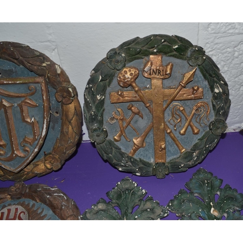 199 - A collection of 19th century or earlier religious plaster plaques and foliage