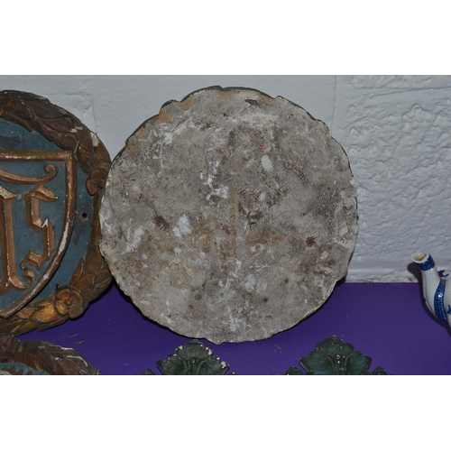 199 - A collection of 19th century or earlier religious plaster plaques and foliage