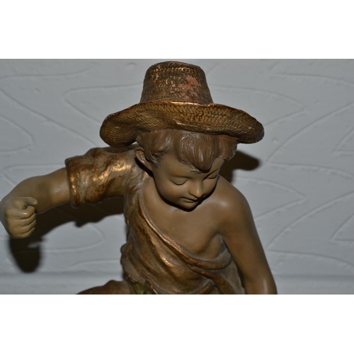 203 - A Rare Goldscheider figural fishbowl stand mounted with a boy fishing c.1900