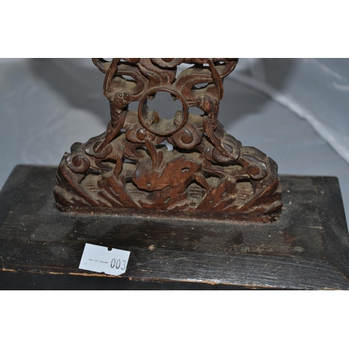 208 - A Chinese hardwood carved mirror stand and a plate stand both c.1900