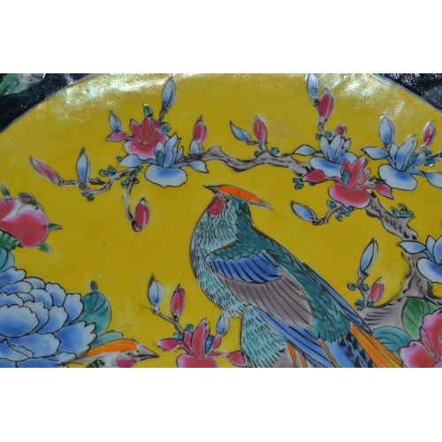 210 - 2 vintage Oriental plates - one Imari and one yellow ground with birds