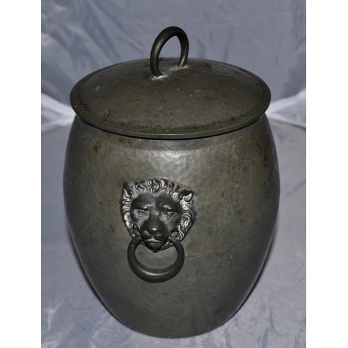 212 - A Tudric & Co pewter biscuit barrel with lion head handles c.1930