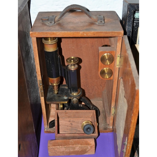 219 - An antique Phillip Harris of Birmingham microscope in case