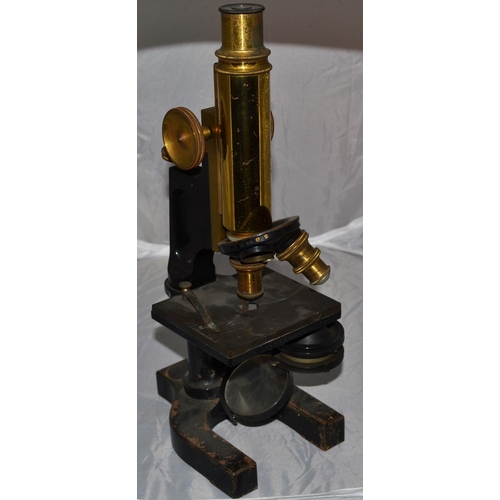 221 - An antique Bausch & Lomb Microscope in case