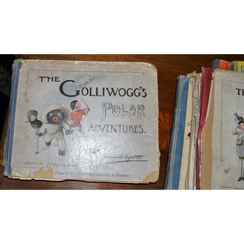 261 - A quantity of vintage children's books to include Gollywogg books