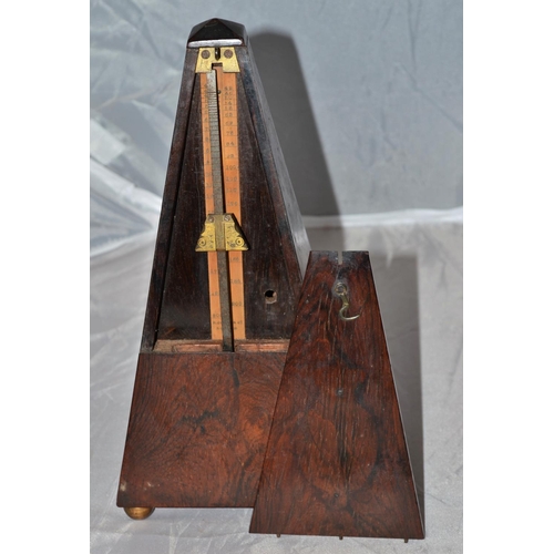 249a - A 19th century rosewood metronome by Robert Cocks of London