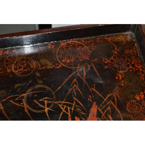 235 - An antique Japanese lacquer tray decorated with birds