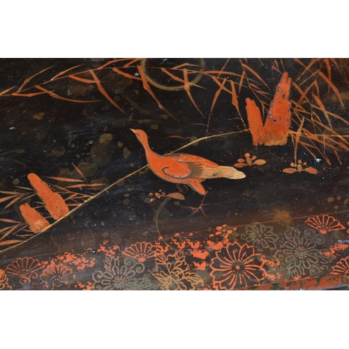 235 - An antique Japanese lacquer tray decorated with birds