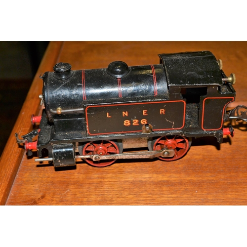 280 - A Hornby clockwork toy train and 2 carriages - Marjorie and LNER 826