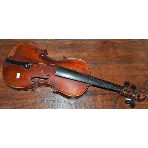 284 - An antique violin with a one piece back bearing a Stradivarius label - case and bow