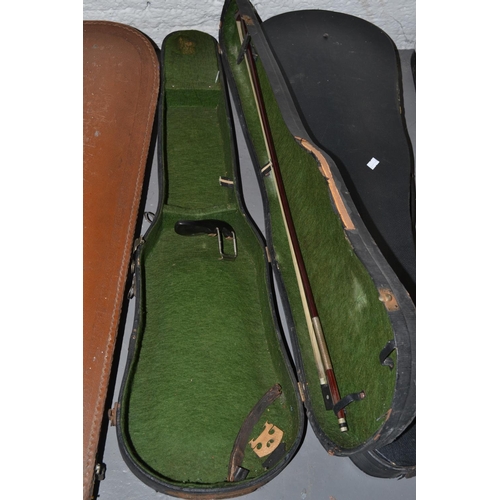 284 - An antique violin with a one piece back bearing a Stradivarius label - case and bow