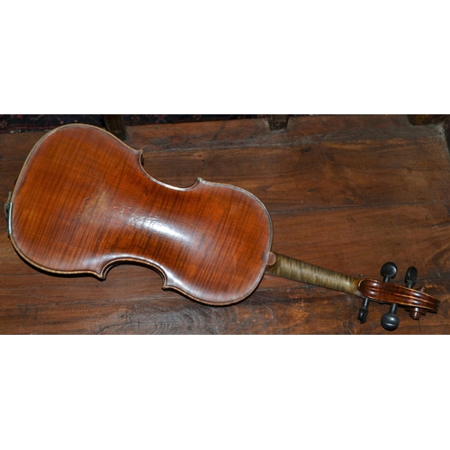 288 - An antique violin marked 