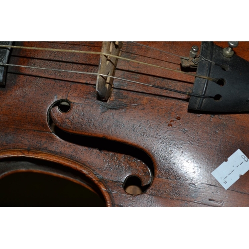 288 - An antique violin marked 